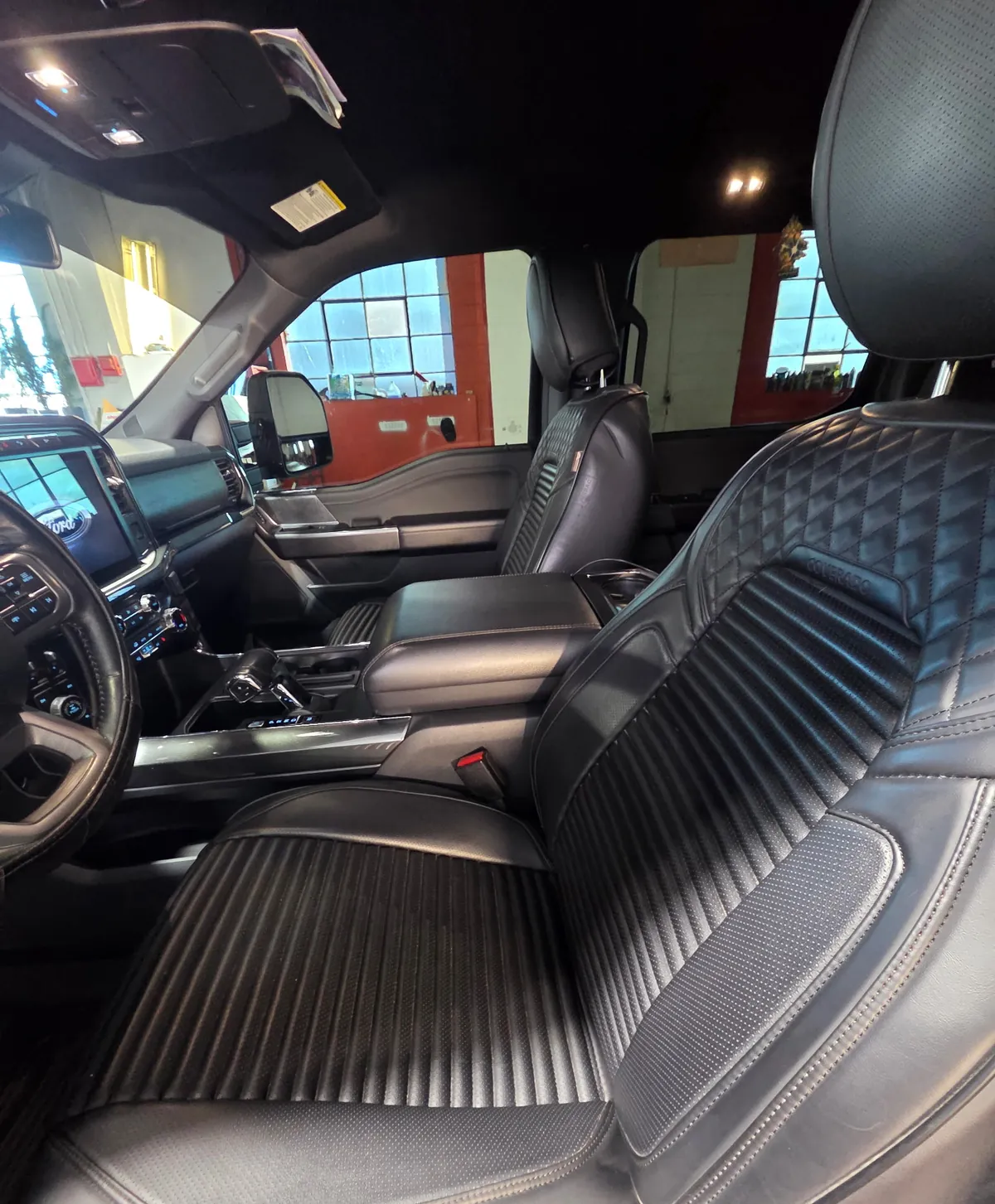 Close-up of quilted black seats in a Ford F-150
